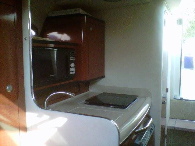 Noleggio rent sea ray Sundancer 315 con patente sul lago di ga